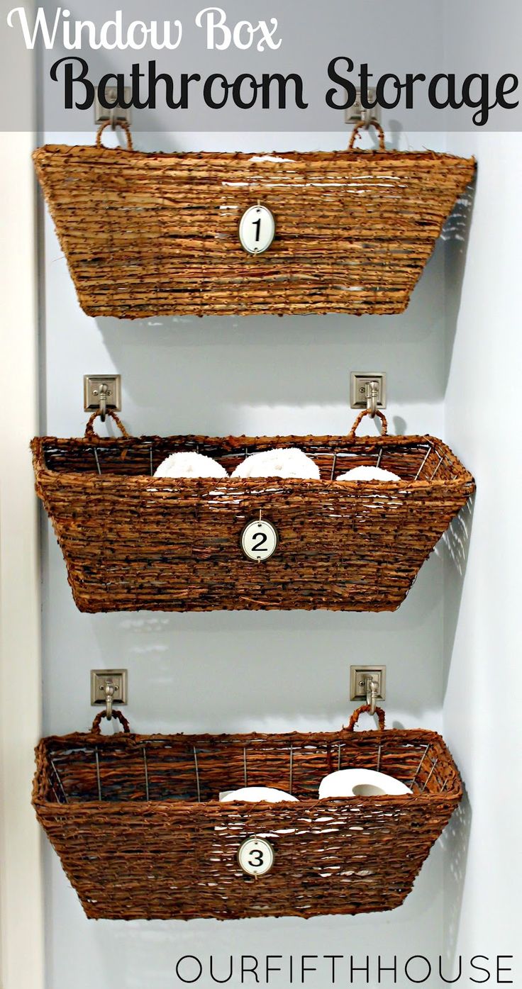 Window boxes used as bathroom storage. Such a great idea.